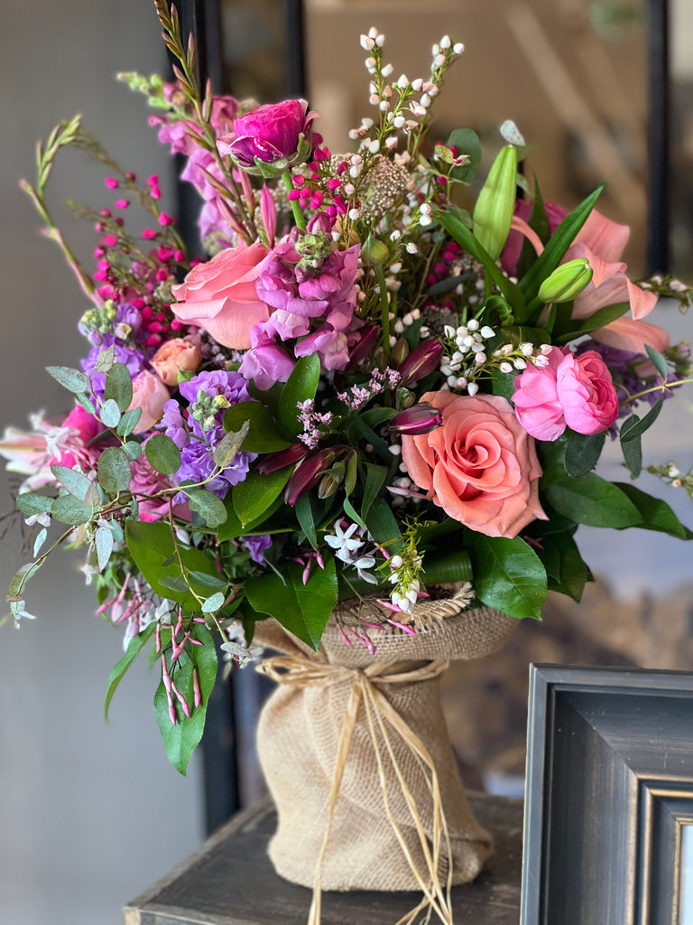 A Classic Burlap Wrapped Hand-Tied Bouquet