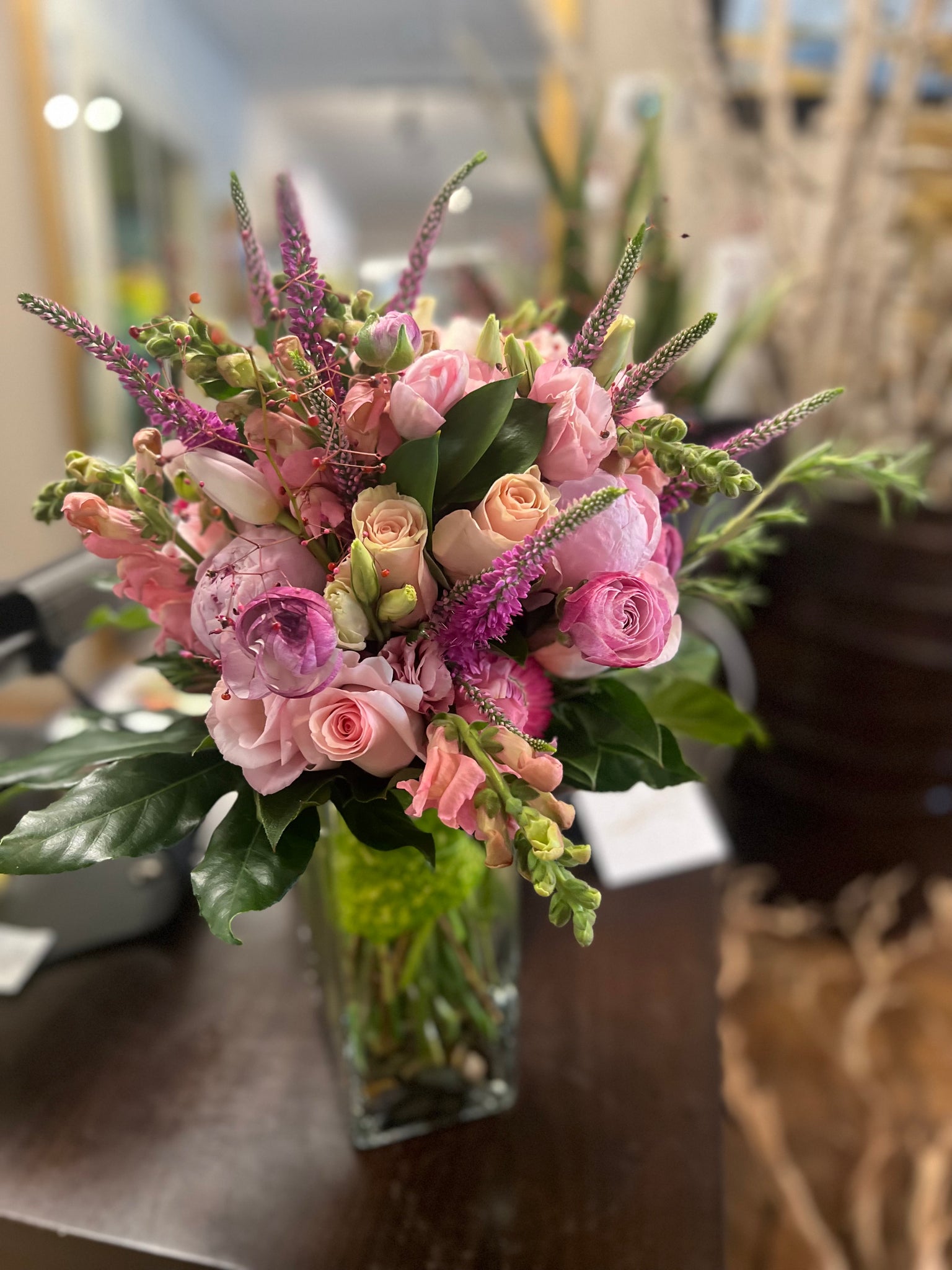 Classic Collection: hand-tied bouquet wrapped in leaves