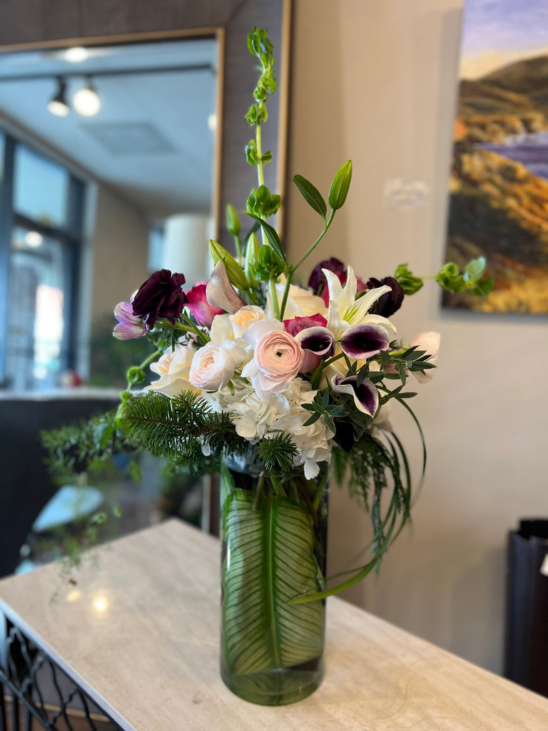 Lush & eclectic, orchids, draping foliage