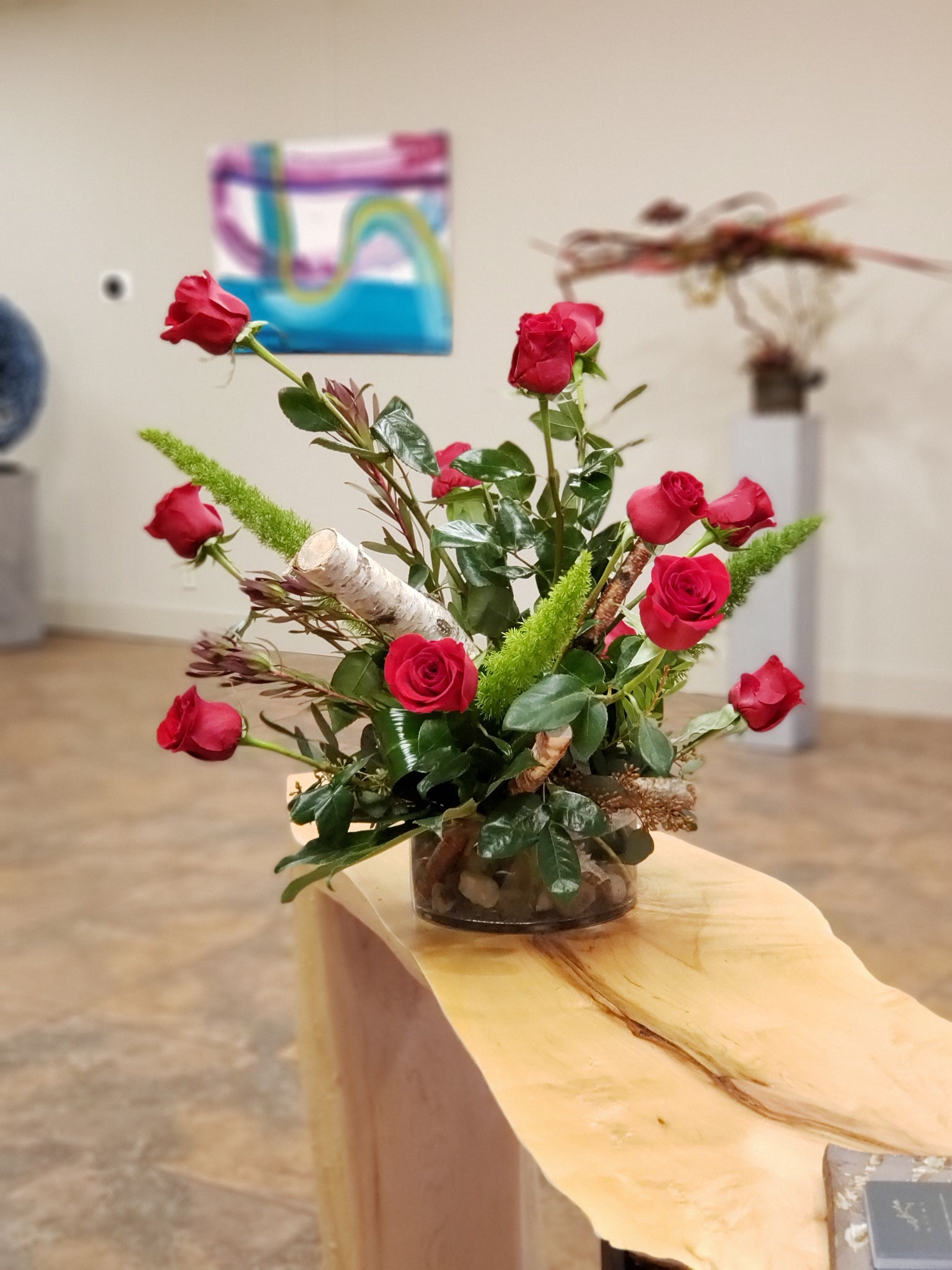 Rose centerpiece, height variance, birch wood poles