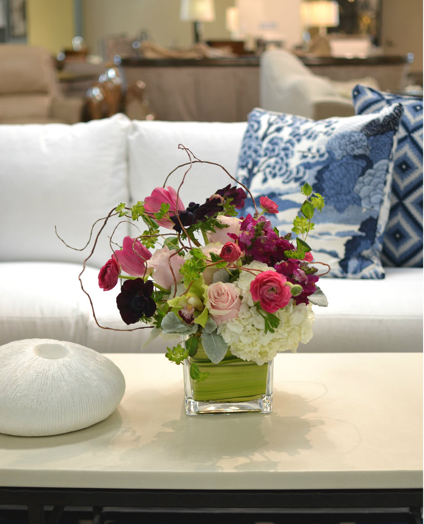 Lush & brimful mix, sheltered with curly willow in cube vase