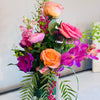Compact and eclectic floral mix, rectangle glass vase