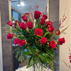 Three dozen roses classic design, curly willow branches & foliage, cylinder vase